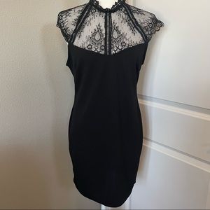 IRIS Black dress with lace details great condition size L